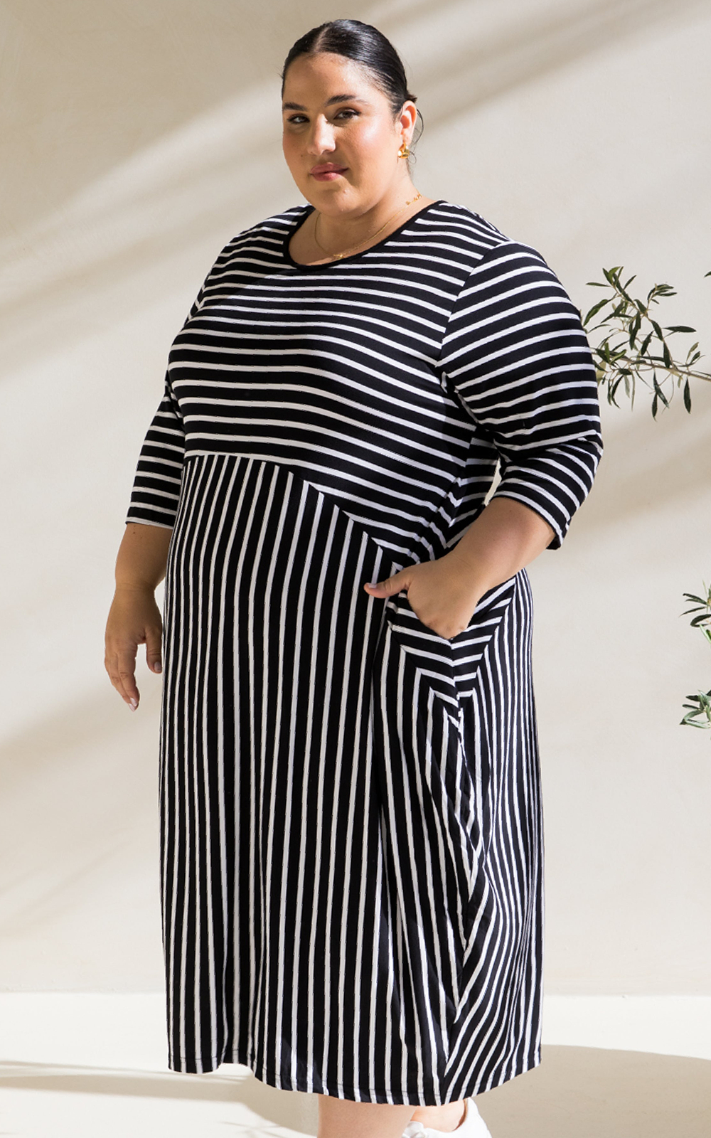 Alviva Stripe Dress product photo.