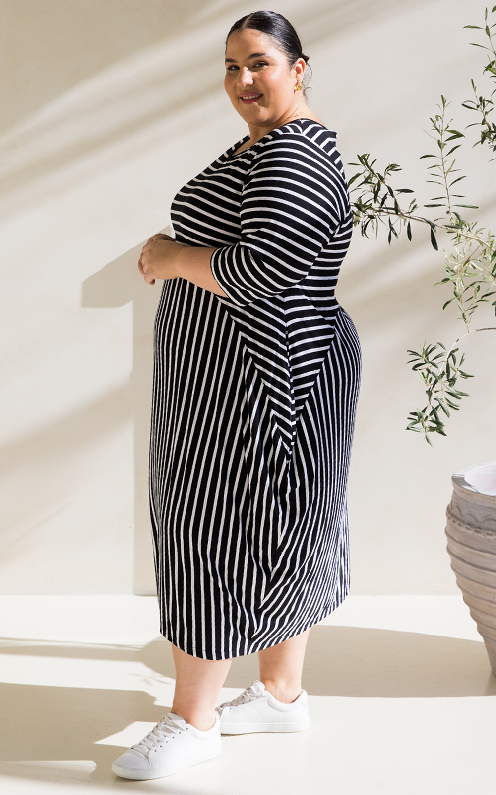 Alviva Stripe Dress product photo.