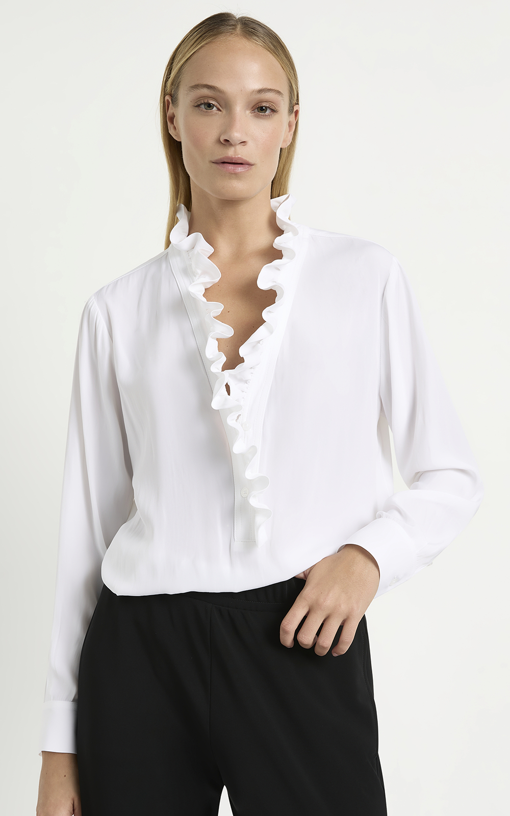 Frill Neck Blouse product photo.