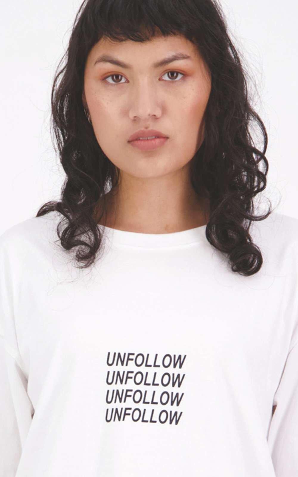 Reiji Unfollow Tee product photo.