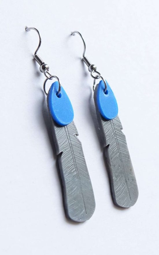 Kokako Feather Earrings product photo.