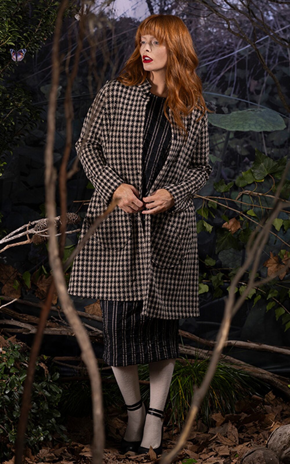 Houndstooth Merchant Coat product photo.