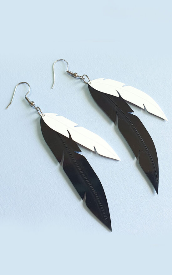 Pied Cormorant Feather Earrings product photo.