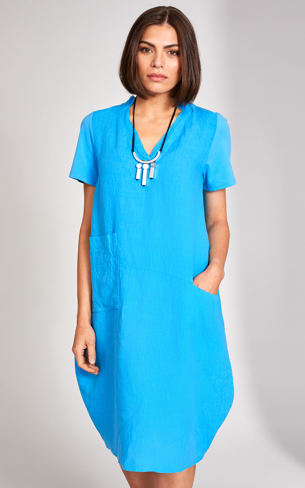 Assymetric Pocket Dress product photo.